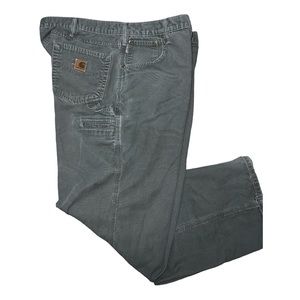 Mens Carhartt Green Heavyweight Cargo
Pants Size 42 x 32
100% cotton
Loose Fit